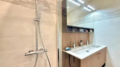 a bathroom with a sink and a shower at La Vista Mar - Apt Seaview Near Airport-AC-Parking in Saint-Laurent-du-Var