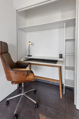 an office with a desk and a chair at Le Galion - City centre - Bright - AC - Parking in Cagnes-sur-Mer