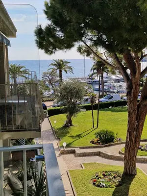 a view of the ocean from the balcony of a house at Centre ville de St Jean Cap Ferrat in Saint-Jean-Cap-Ferrat