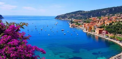 a view of a large body of water with boats at Charmant studio rénové – Place de la République in Villefranche-sur-Mer