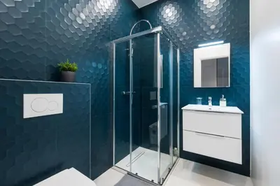 a bathroom with a glass shower and a sink at 1 CASSINI LOT 5 - Magnifique Studio - Garibaldi - Port in Nice