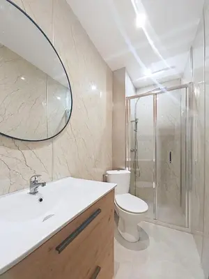a bathroom with a sink and a toilet and a shower at Beach Studio on Cagnes sea front in Cagnes-sur-Mer