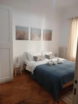 a bedroom with a bed with two towels on it at Fantastic Centra Peaceful Location in Nice