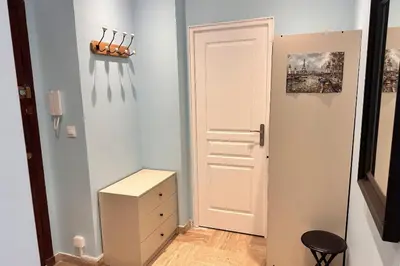a room with a white door and a cabinet at Studio with veranda 5min walk to the beach in Nice