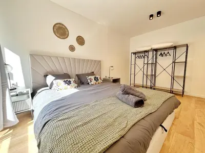 a bedroom with a large bed in a room at Ref 127 - 3 Pièces 2 chambres Nice Port in Nice