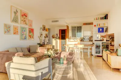 a living room with a couch and a table at - Casa ATI - in Villefranche-sur-Mer