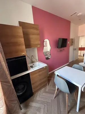 a kitchen with a sink and a washing machine at MOON 23 - Appartement Nice 2P in Nice