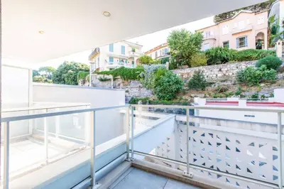 a balcony with a view of a building at Résidence So Amata , à deux pas du Port de Nice in Nice