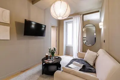 a living room with a couch and a table at Wonderful Stay close to Garibaldi - Aircon in Nice