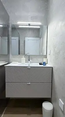 a bathroom with a sink and a toilet and a mirror at New T2 Nice Jean Médecin - L'Hacienda de Bali in Nice