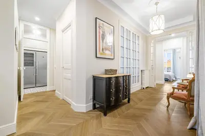 a living room with a hallway with a table and chairs at Nice Renting - AMOUR - Haussmann Luxury Sea Balcony Free Parking in Nice
