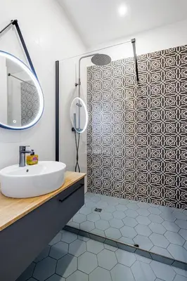 a bathroom with a sink and a shower at Nice Renting - AMOUR - Haussmann Luxury Sea Balcony Free Parking in Nice