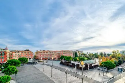 a view of a city with red brick buildings at Emplacement exceptionnel Deux Chambres AC WIFI in Nice