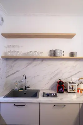 a kitchen with a sink and a counter top at T3 résidence neuve Centre-Ville 6 Couchages in Nice