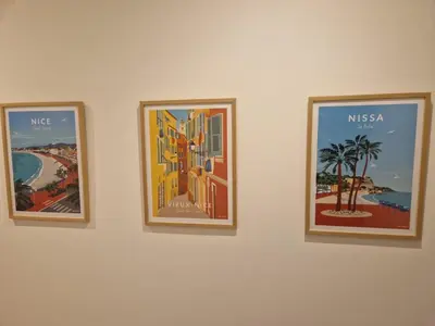 three framed posters hanging on a wall at Alex&Chris in Nice