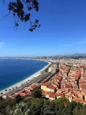 a view of a city and the beach at Authentic Provençal Studio in Nice