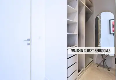 a room with a door and a walk in closet at Nestor&Jeeves - TERRASSE D OR - By sea - Terrace in Nice