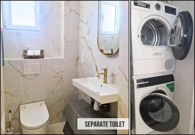 a bathroom with a washing machine and a sink at Nestor&Jeeves - TERRASSE D OR - By sea - Terrace in Nice