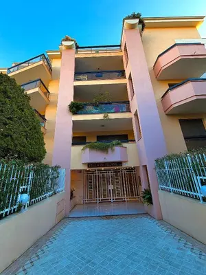 a building with a gate in front of it at Appartement moderne climatisé avec piscine, terrasse et parking - Proche Promenade des Anglais in Nice