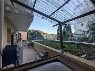 a view from the balcony of a house at Nice Cosy Garden in Nice