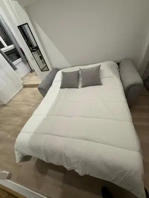 a large bed in a room with at Studio Rio - Jean Médecin - La Riviera LCD in Nice