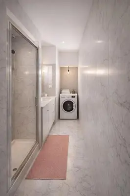a bathroom with a washing machine and a shower at Blanche - From Nice with love in Nice