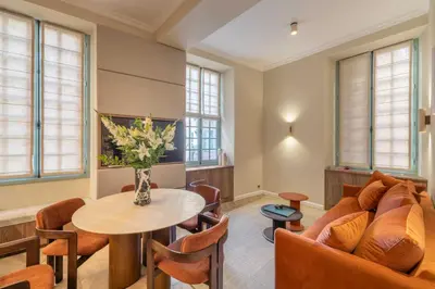 a living room with a couch and a table at 2BDR 6P central A C apt - heart of Nice in Nice