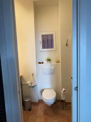 a door leading to a bedroom with a bed at VILLA BELLA VISTA BAY VI4488 By Riviera Holiday Homes in Villefranche-sur-Mer