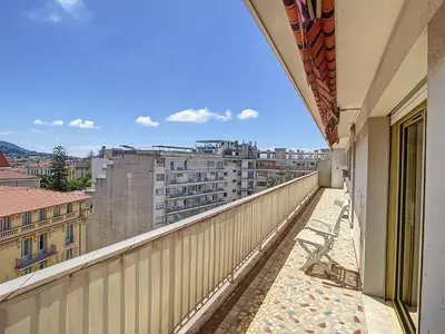 a balcony with a view of a city at Penthouse d'exception avec terrasse panoramique in Nice