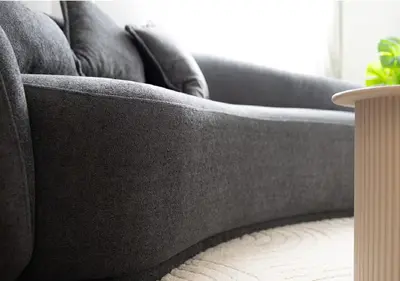 a close up of a couch in a living room at Moderne et lumineux en centre-ville - 2 Chambres in Nice