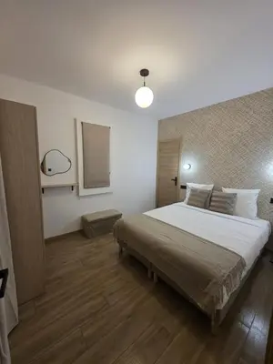 a bedroom with a large bed in a room at La costière in Nice