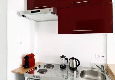 a kitchen with a sink and a stove top oven at DeLuxe Studio Cosy, Promenade des Anglais, NICE CENTRE in Nice