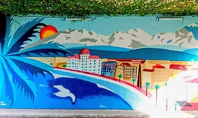 a mural of a city and a cat on a wall at Artemare, il fascino del classico con ogni comfort in Nice