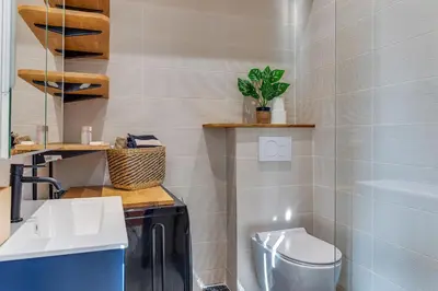 a bathroom with a toilet and a sink at STUDIO AZUR AP4487 By Riviera Holiday Homes in Villefranche-sur-Mer