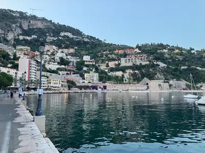 a view of a body of water with a city at Duplex Apartment Old Town & Beach in Villefranche-sur-Mer