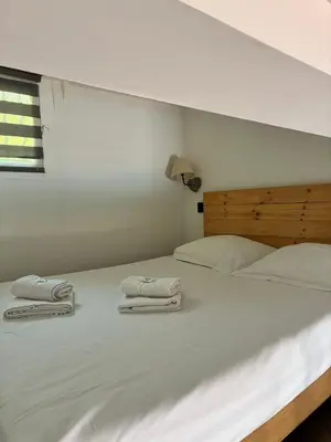 a bedroom with two towels on a white bed at Magnifique 2P Vieux Nice AC-WIFI in Nice