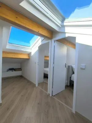 a room with a skylight in the ceiling at Elegant Renovated Apartment Nice Port AC Sleeps 4 in Nice