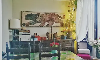 a room with a painting of an elephant on the wall at Shared Appartment with Kitten in Nice