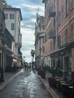 a cobblestone street in a city with buildings at Joli studio rénové vieux Nice in Nice