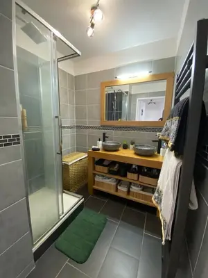 a swimming pool in front of a apartment building at WeHost- CORNICHE Soleil Couchant 2 chambres 4pers,Parking,Piscine in Nice