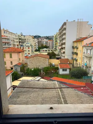 a view of a city from the roof of a building at Renovated 2-room apartment Sleeps 4 Tram and shops nearby in Nice
