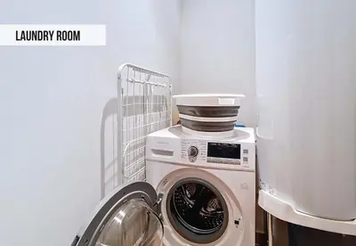 a washer and dryer in a laundry room at Nestor&Jeeves - GELATO - Bright - Balcony in Nice