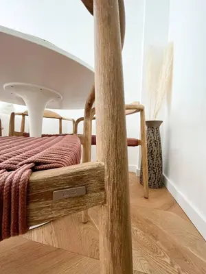 a bedroom with a wooden bed with a pole at Nice Boheme in Nice