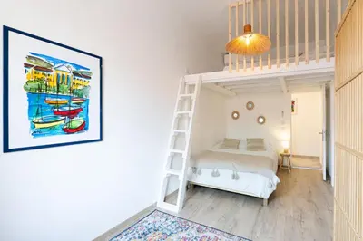 a building with a painting on the side of it at Appartement charmant & cosy au cœur du Vieux Nice in Nice