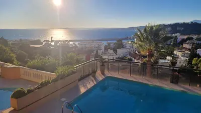 a swimming pool on a balcony with a view of the ocean at Nice Mont Boron proche du Port in Nice