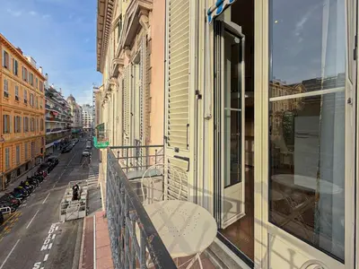 a balcony of a building with a view of a street at Place Grimaldi - Wifi, AC, 3pers in Nice
