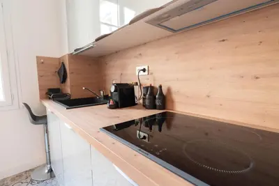a kitchen with a sink and a counter top at Bright apartment Nice harbour in Nice
