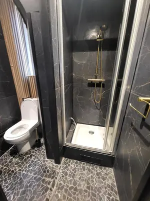 a bathroom with a shower and a toilet at Studio Cosy Mezzanine 2-4p Carré d'Or in Nice