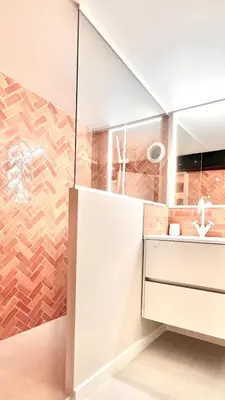 a bathroom with a shower and a white cabinet at Superbe duplex proche cours Saleya in Nice