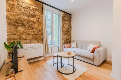 a living room with a couch and a table at Dolce Vita - Studio Centre Nice in Nice